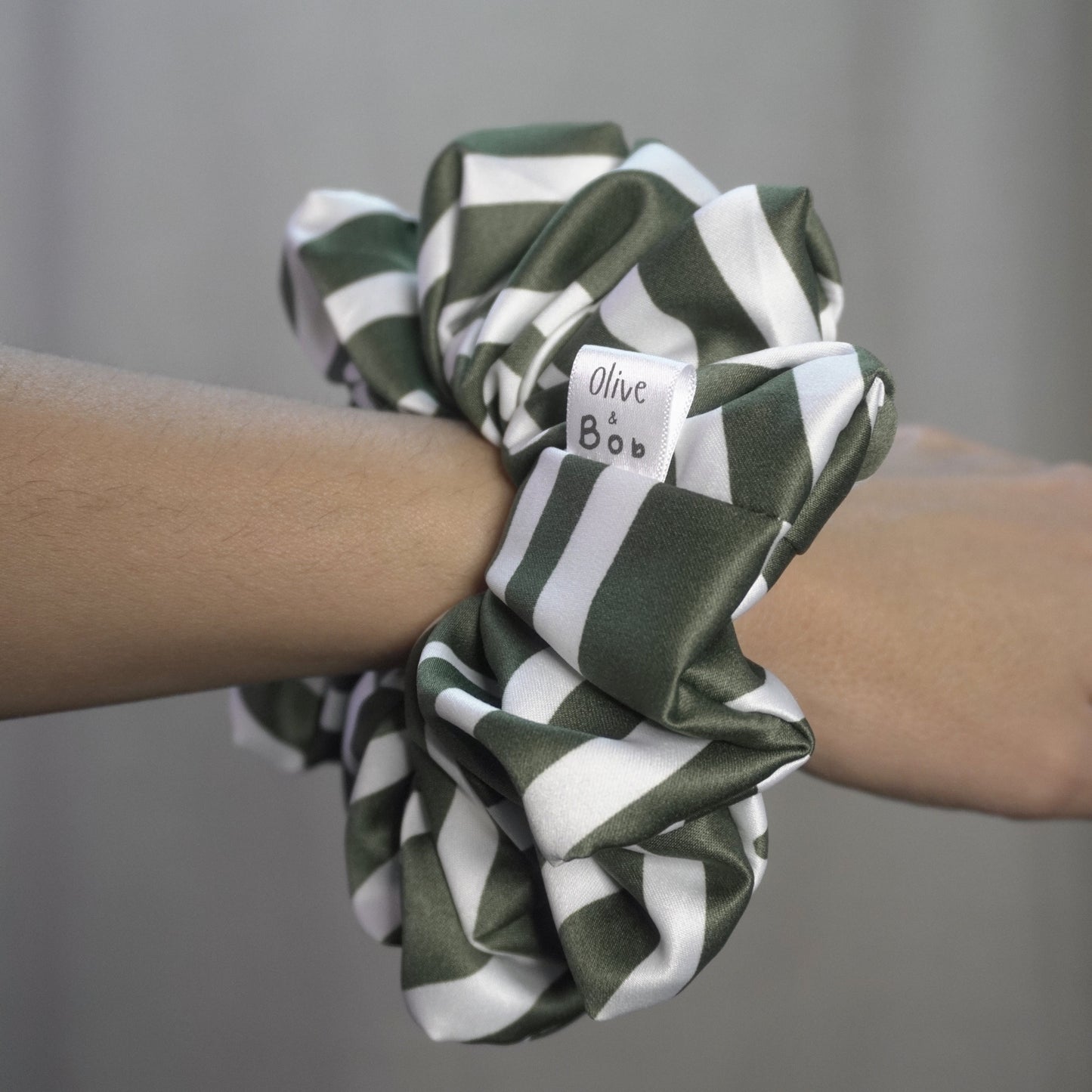 Green and white zebra patterned satin scrunchie
