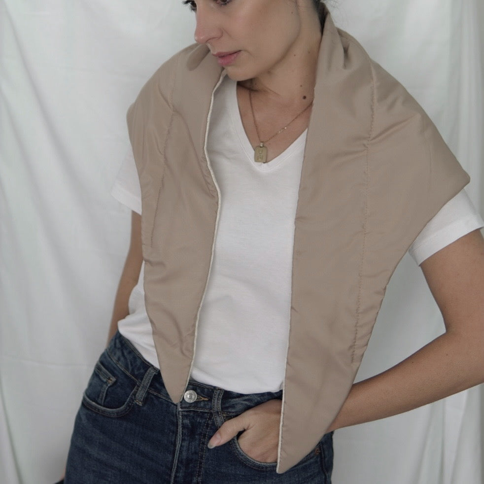Reversible quilted shawl in soft sand-toned cotton and oat-hued linen, designed for effortless layering with a natural, textured finish.