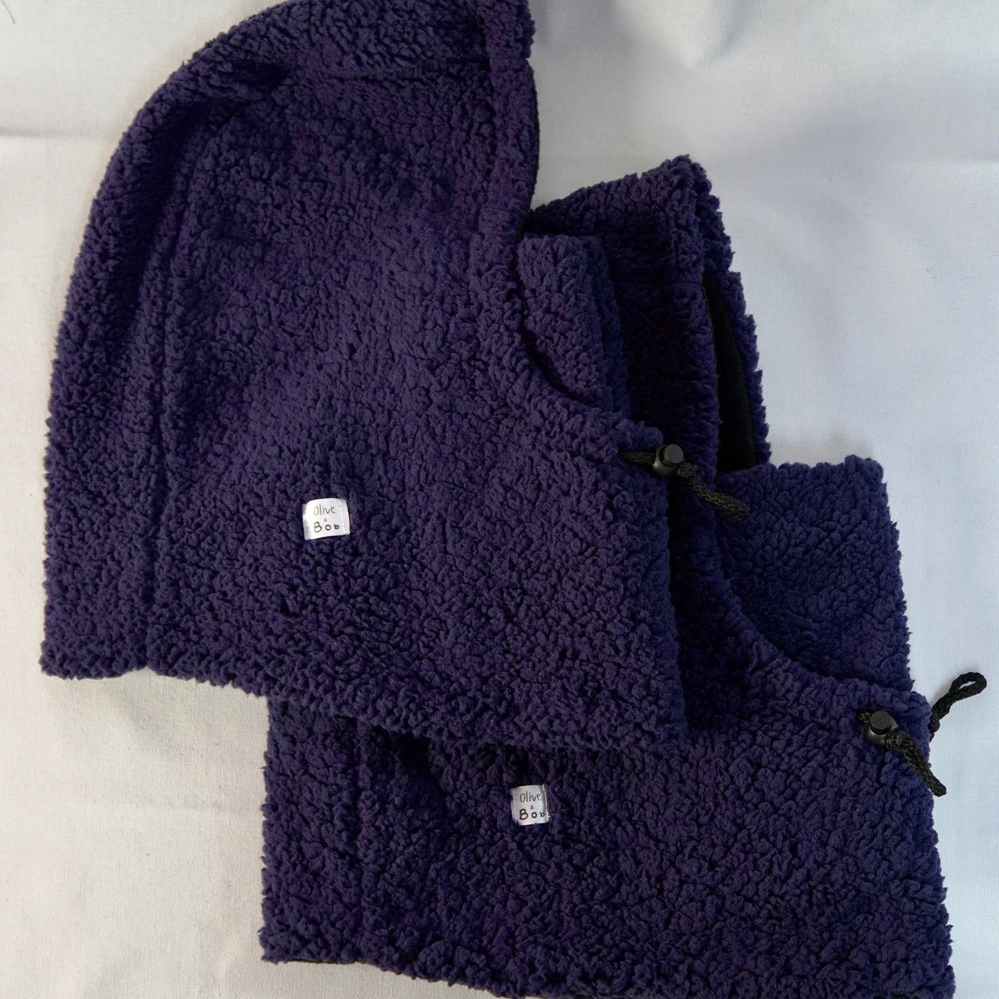 Handmade sherpa hoodie balaclava with a cozy, oversized fit—featuring a soft texture, built-in hood, and snug face coverage for warmth and comfort.