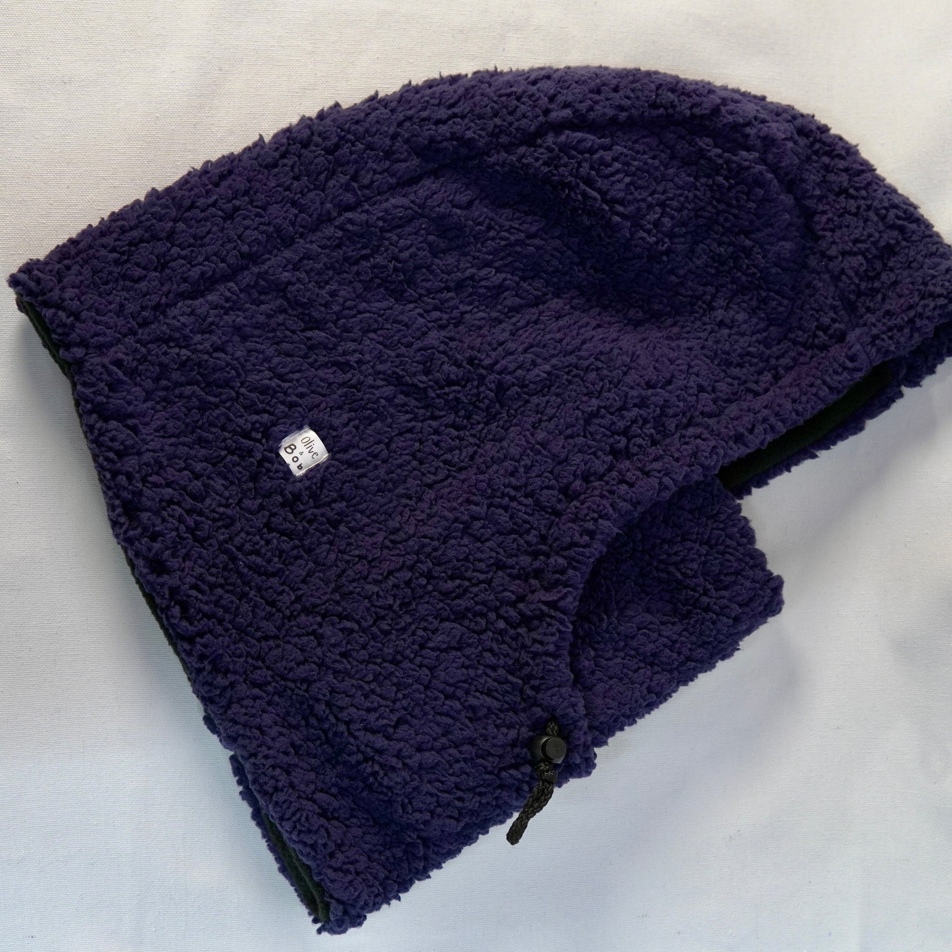 Handmade sherpa hoodie balaclava with a cozy, oversized fit—featuring a soft texture, built-in hood, and snug face coverage for warmth and comfort.